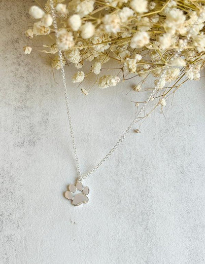 Elegant Silver Pendant with Paw Print on a Chain